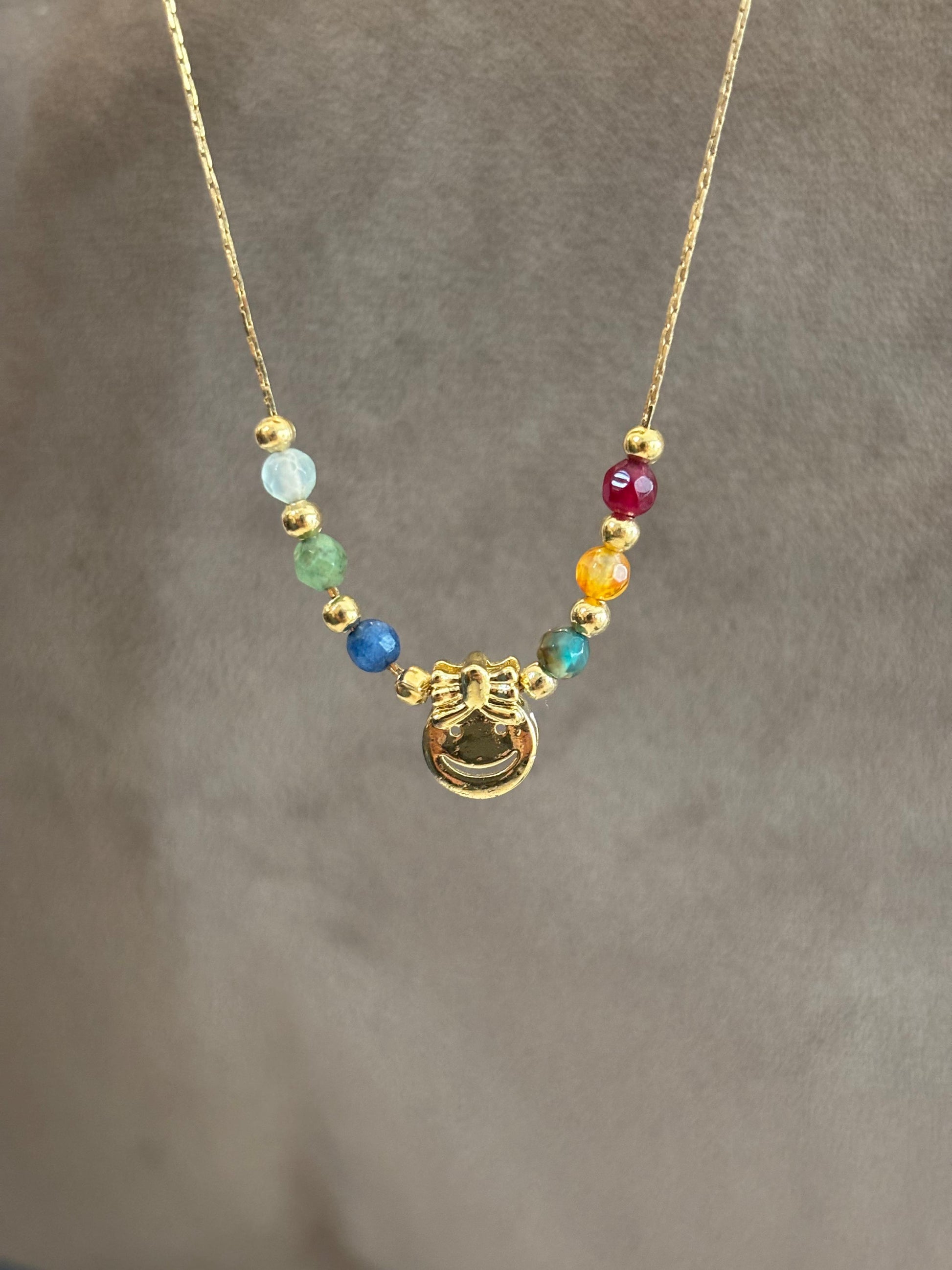 Collar carita feliz