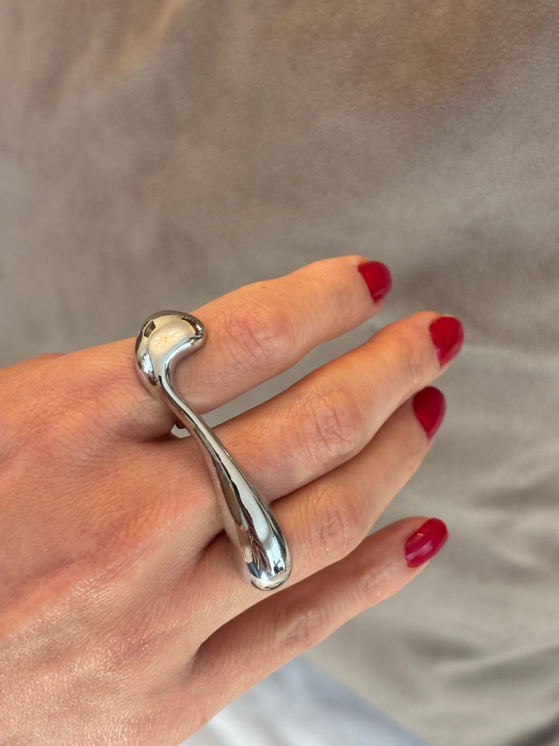 Anillo multi-dedo