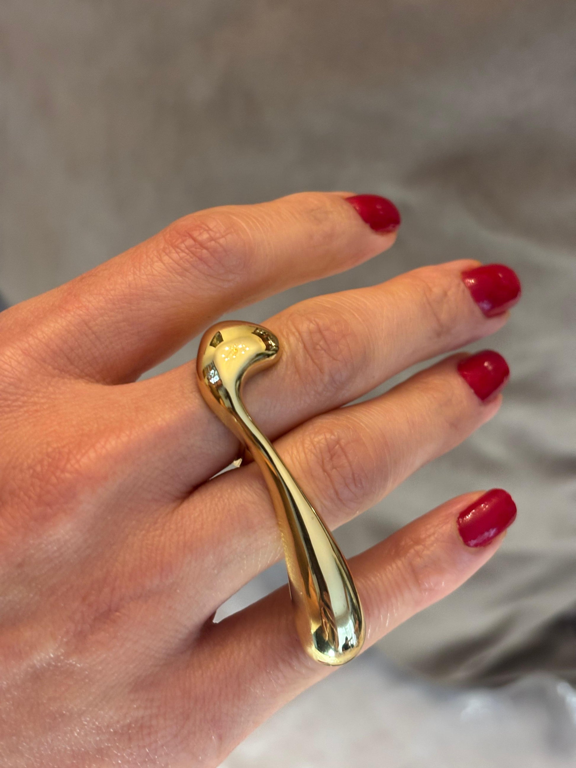 Anillo multi-dedo